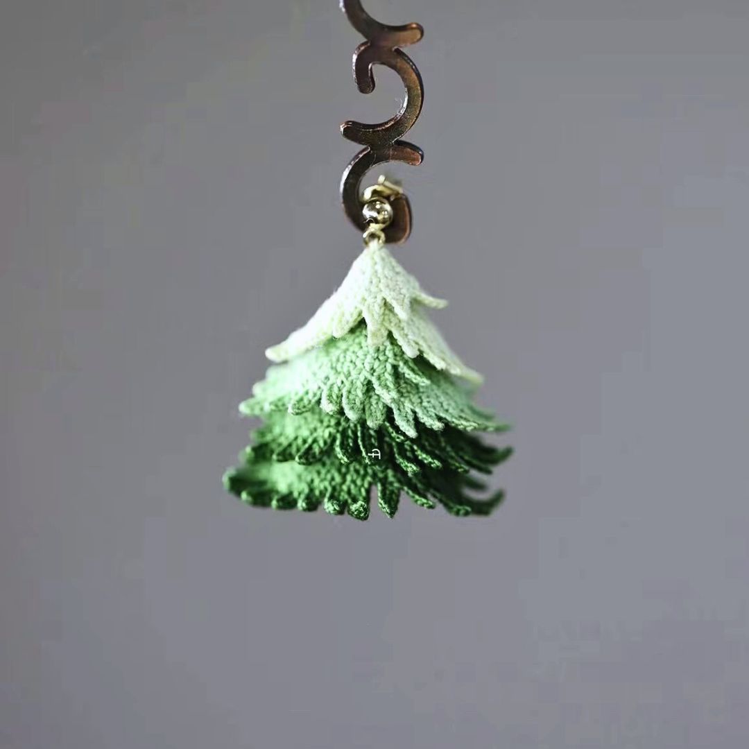 Short-style micro crochet Christmas tree earrings in handmade festive design.