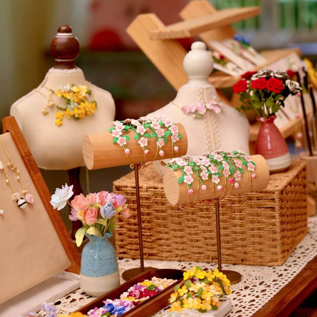 Micro crochet jewelry detail showing fine stitches and tiny lace thread craftsmanship.