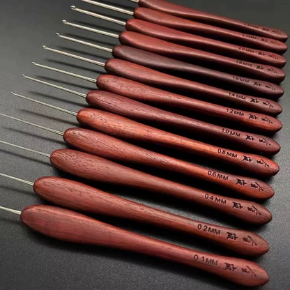 set of micro crochet hooks with rosewood handles showing clearly engraved sizes from 0.1 mm to 3.5 mm