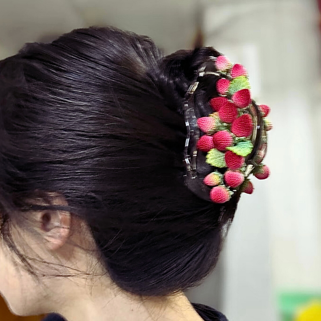 Crochet strawberry hair claw worn in hair, soft everyday cottagecore hairstyle