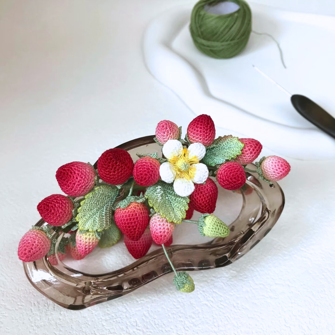 Crochet strawberry hair claw clip, front view of red berry cottagecore hair accessory