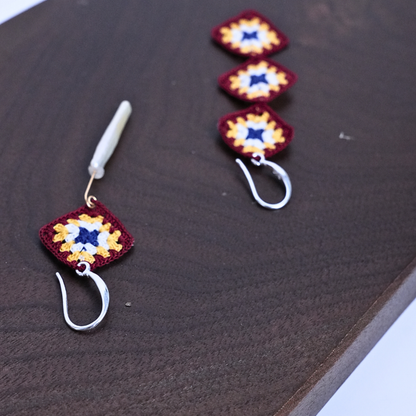 999 silver hook detail on asymmetrical granny square crochet earrings