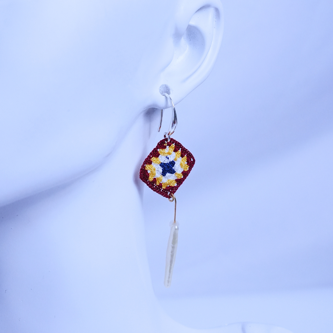 Pearl drop granny square crochet earring worn on ear, lightweight handmade design