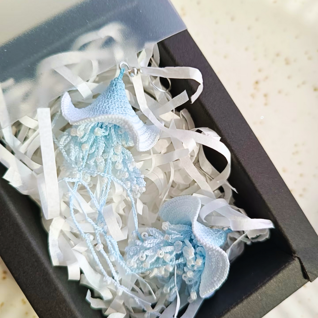 sea blue micro crochet jellyfish earrings in branded gift box, ready for gifting