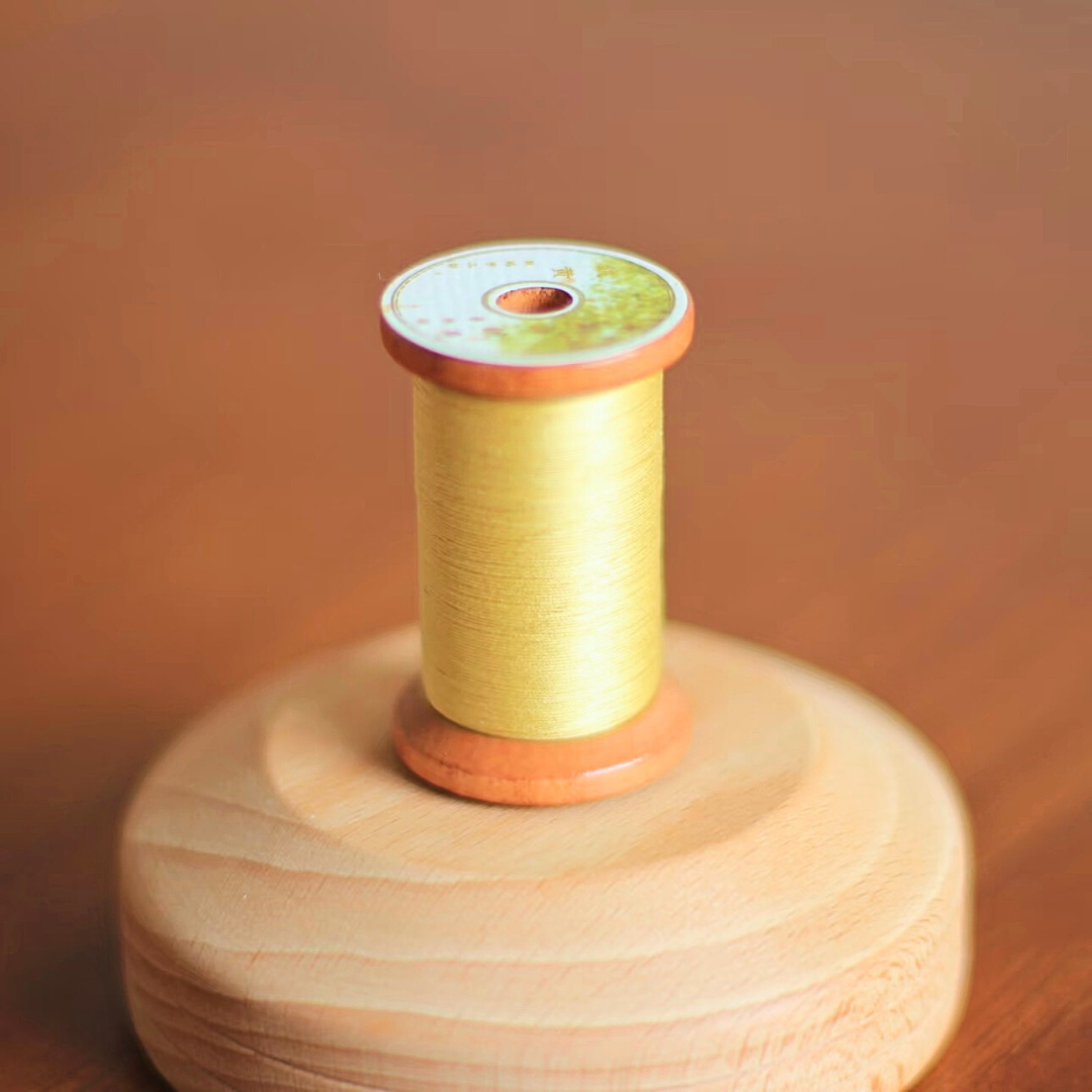 Micro crochet lace thread size 80 in muted yellow